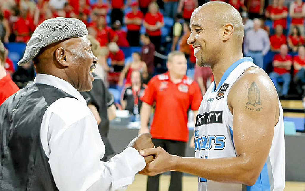 NBL legend Cal Bruton congratules his son, CJ. NBL legend Cal Bruton congratules his son, CJ.