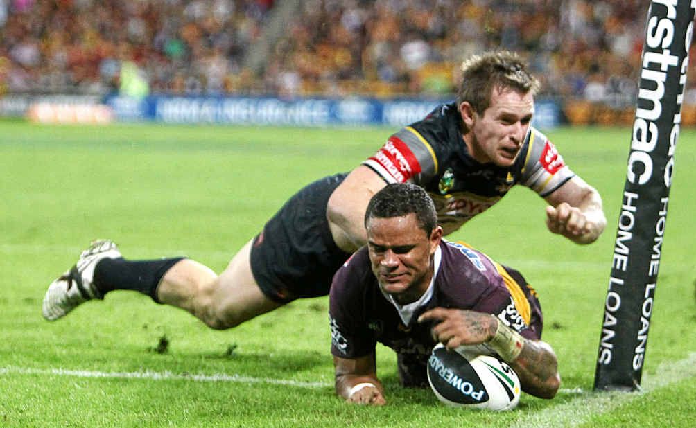 The Broncos' Josh Hoffman scores the winning try in Brisbane on Friday night, evading the tackle attempt of the Cowboys' Michael Morgan. The Broncos' Josh Hoffman scores the winning try in Brisbane on Friday night, evading the tackle attempt of the Cowboys' Michael Morgan.