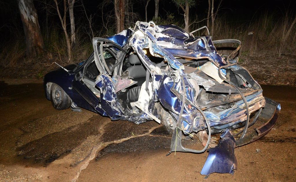 The wreck of the Holden Commodore that was wiped out by a freight train on Saturday night. The wreck of the Holden Commodore that was wiped out by a freight train on Saturday night.