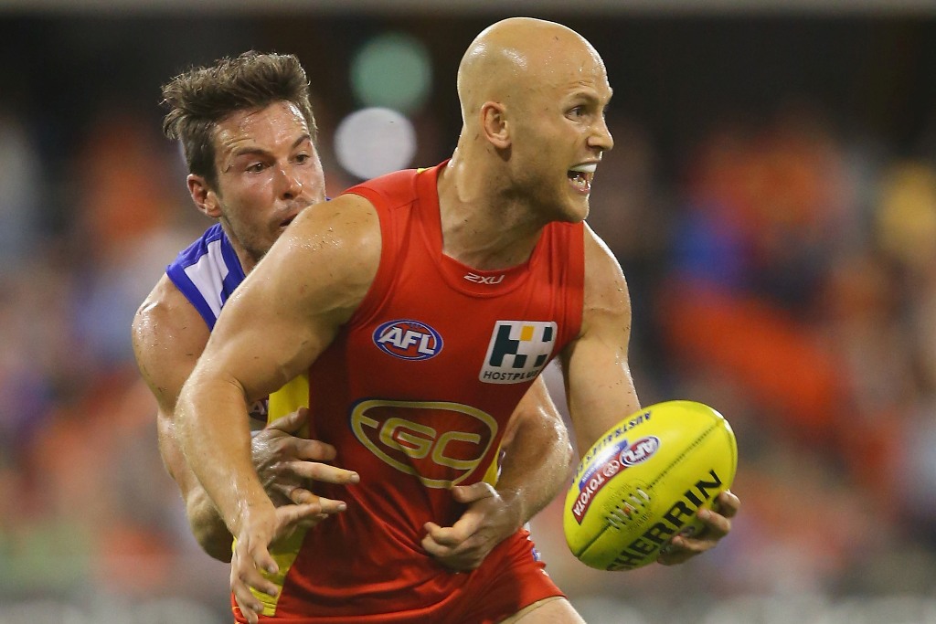 Gary Ablett of the Suns looks to handball during the round three AFL match between the Gold Coast Suns and the Brisbane Lions at Metricon Stadium on April 13, 2013 in Gold Coast, Australia. Gary Ablett of the Suns looks to handball during the round three AFL match between the Gold Coast Suns and the Brisbane Lions at Metricon Stadium on April 13, 2013 in Gold Coast, Australia.