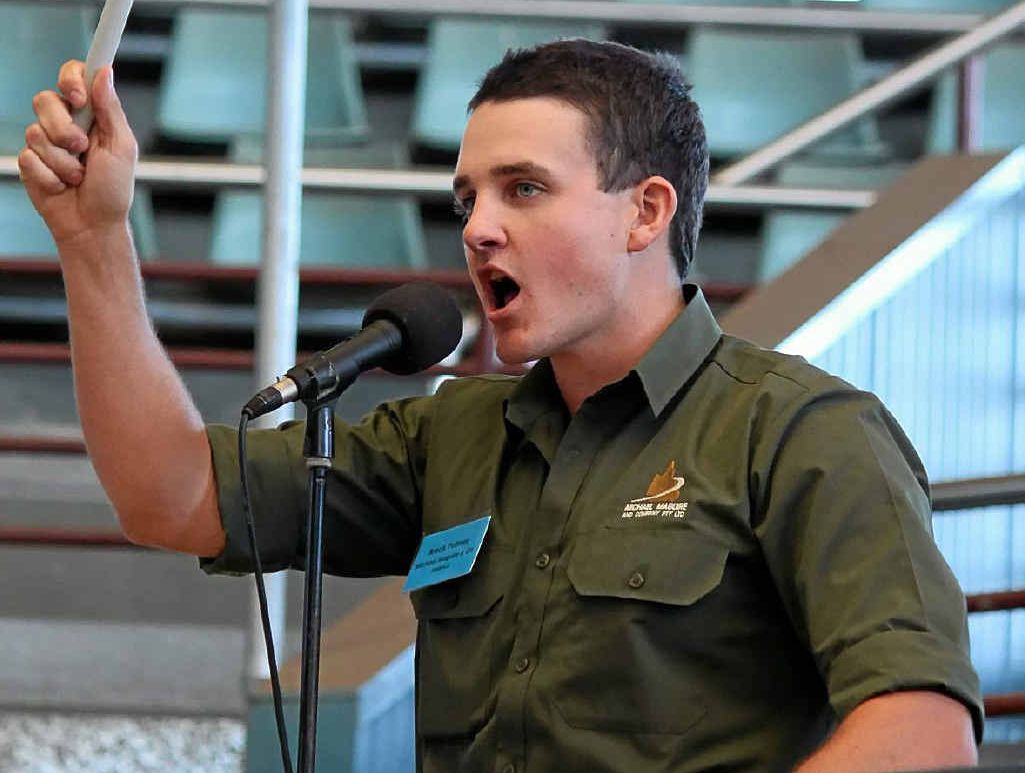 YOUNG GUN: Young Emerald auctioneer Brock Palmer practises his trade.