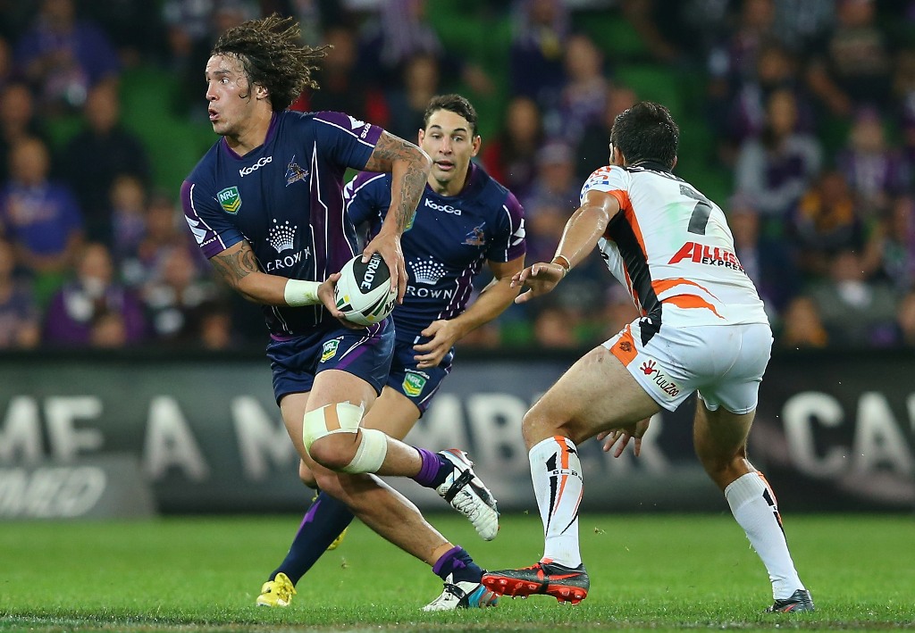 Kevin Proctor of the Storm passes the ball during the round 5 NRL match between the Melbourne Storm and the Wests Tigers at AAMI Stadium on April 8, 2013 in Adelaide, Australia. Kevin Proctor of the Storm passes the ball during the round 5 NRL match between the Melbourne Storm and the Wests Tigers at AAMI Stadium on April 8, 2013 in Adelaide, Australia.