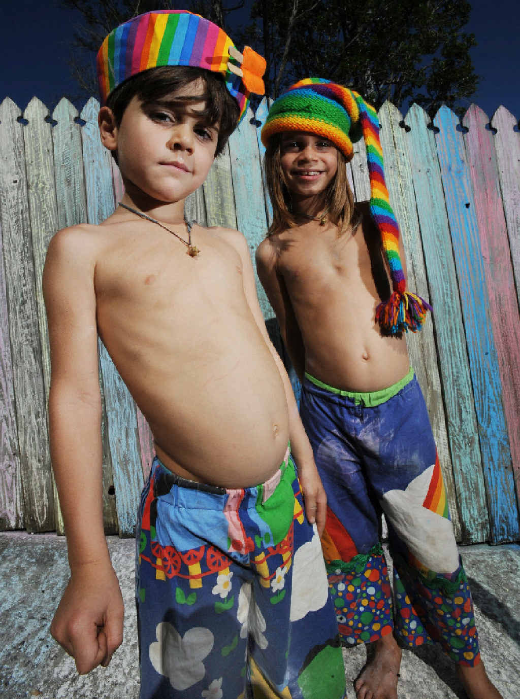 BRIGHT BROTHERS: Kinta, 5, and Takoda, 7 of East Ballina and their technicolour rainbow fence. BRIGHT BROTHERS: Kinta, 5, and Takoda, 7 of East Ballina and their technicolour rainbow fence.