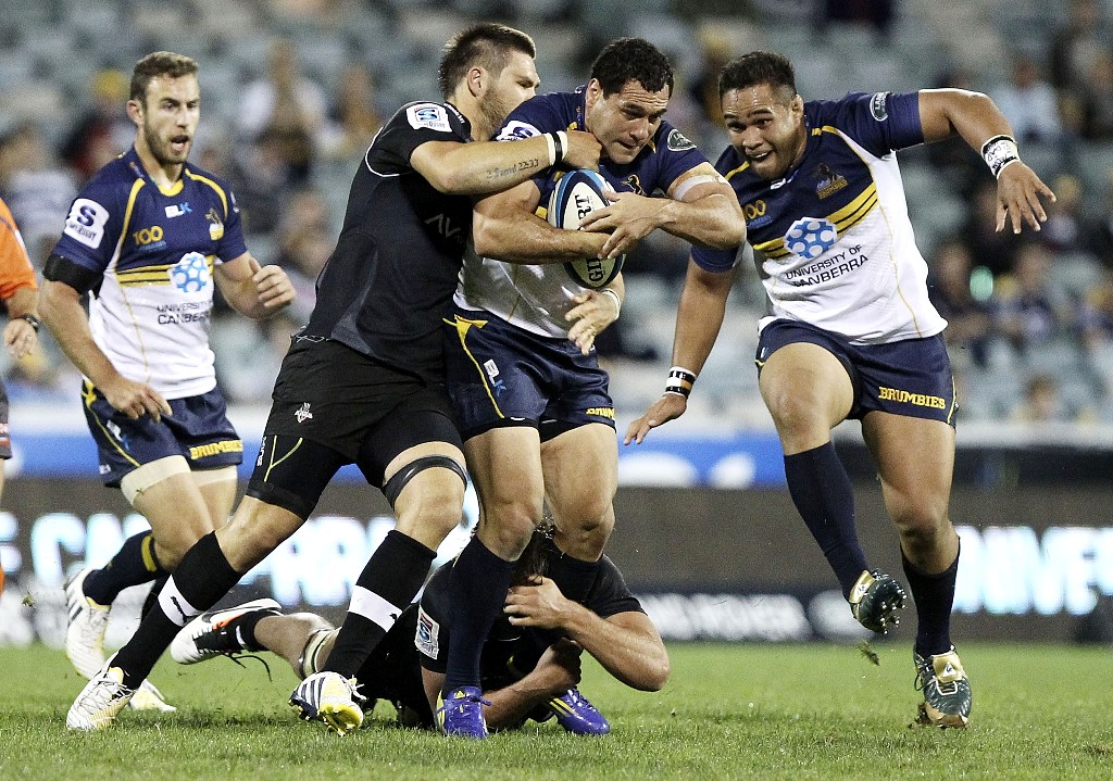 George Smith of the Brumbies is tackled during the round eight Super Rugby match between the Brumbies and the Kings at Canberra Stadium on April 5, 2013 in Canberra, Australia. George Smith of the Brumbies is tackled during the round eight Super Rugby match between the Brumbies and the Kings at Canberra Stadium on April 5, 2013 in Canberra, Australia.