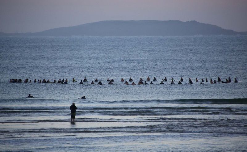 Friends of Jake Kedzlie staged a paddle out in his honour on Sawtell Beach this morning. Friends of Jake Kedzlie staged a paddle out in his honour on Sawtell Beach this morning.