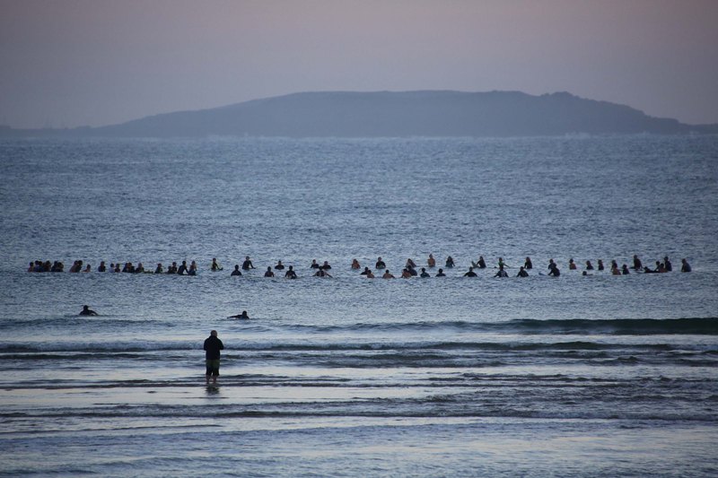 Friends of Jake Kedzlie staged a paddle out in his honour on Sawtell Beach this morning. Friends of Jake Kedzlie staged a paddle out in his honour on Sawtell Beach this morning.