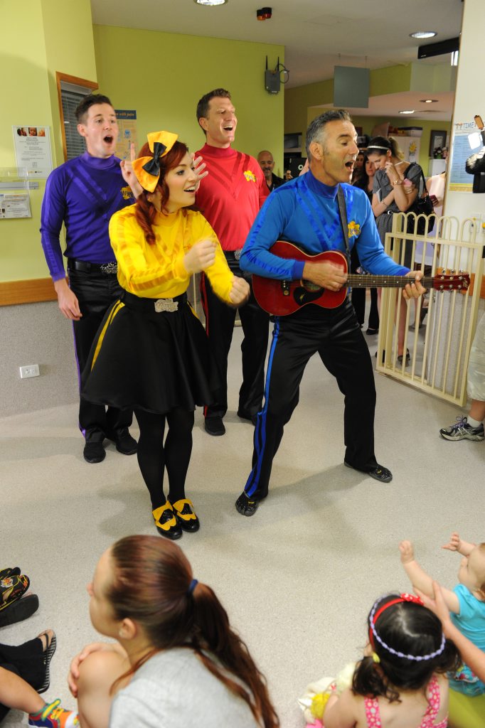 Lachy, Emma, Simon and Anthony perform for an audience of kids at the Bundaberg Hospital. 