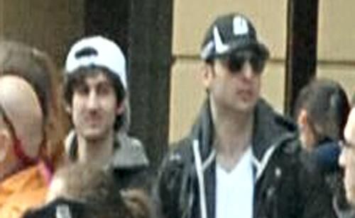 The Boston bombing suspects as they appeared in surveillance footage. The Boston bombing suspects as they appeared in surveillance footage.