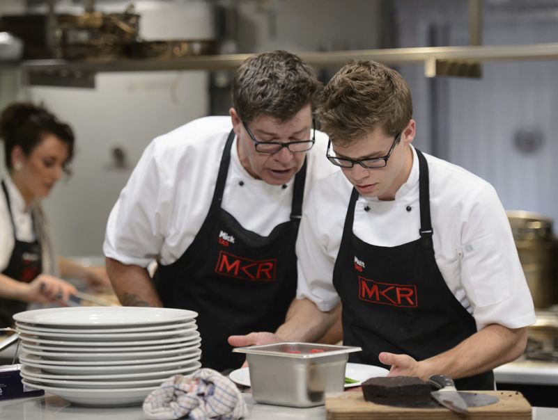 The father and son staying cool under pressure in Comeback Kitchen. The father and son staying cool under pressure in Comeback Kitchen.