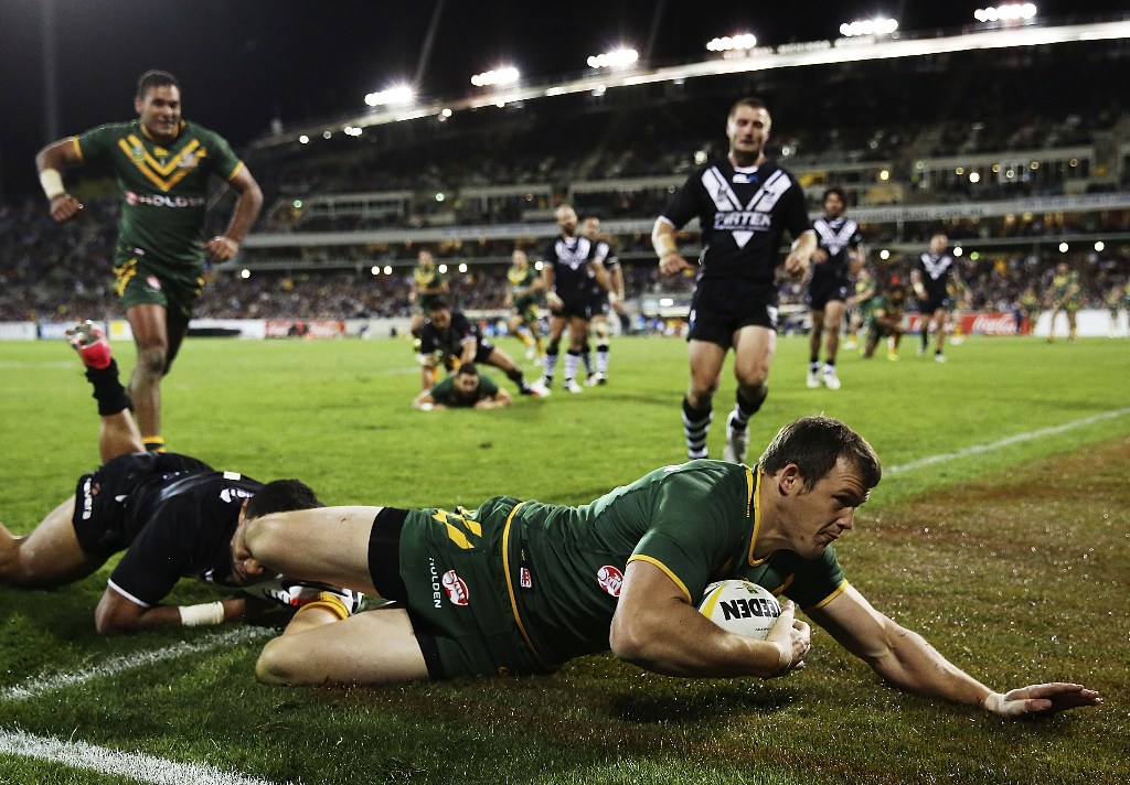 Brett Morris of the Kangaroos scores a try during the ANZAC Test match between the Australian Kangaroos and the New Zealand Kiwis at Canberra Stadium on April 19, 2013 in Canberra, Australia. Brett Morris of the Kangaroos scores a try during the ANZAC Test match between the Australian Kangaroos and the New Zealand Kiwis at Canberra Stadium on April 19, 2013 in Canberra, Australia.