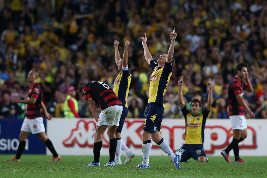 Daniel McBreen of the Mariners and team mates celebrate winning the A-League 2013 Grand Final match between the Western Sydney Wanderers and the Central Coast Mariners at Allianz Stadium on April 21, 2013 in Sydney, Australia. Daniel McBreen of the Mariners and team mates celebrate winning the A-League 2013 Grand Final match between the Western Sydney Wanderers and the Central Coast Mariners at Allianz Stadium on April 21, 2013 in Sydney, Australia.