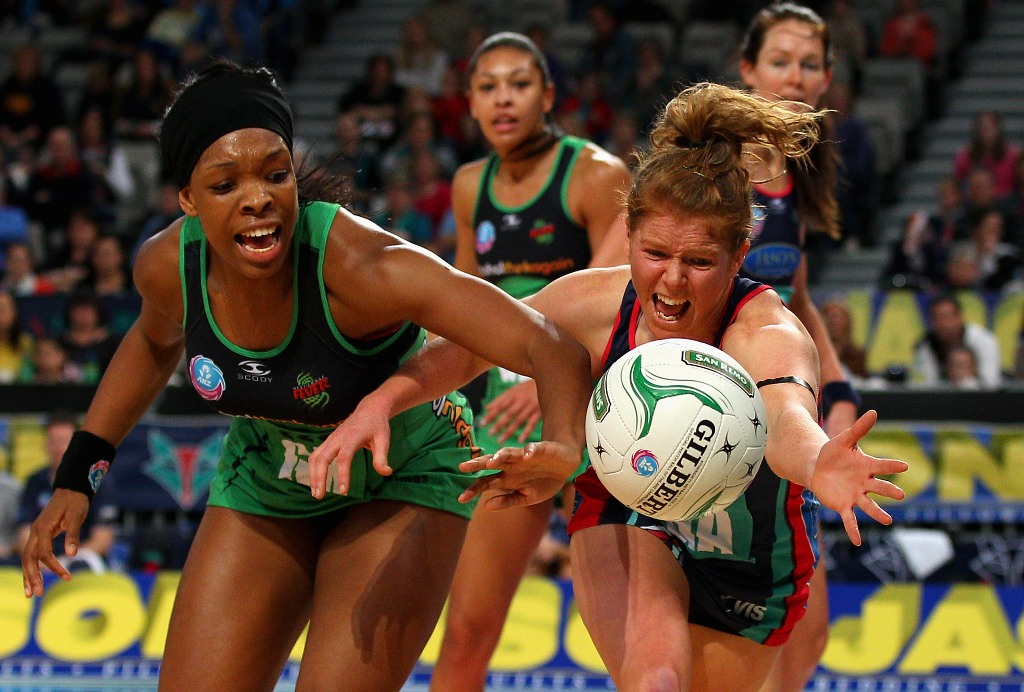 Eboni Beckford-Chambers of the Fever (L) contests for the ball. Eboni Beckford-Chambers of the Fever (L) contests for the ball.