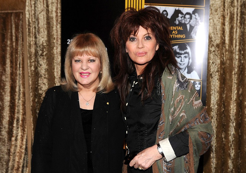 Legendary singer Little Pattie (left) and Chrissy Amphlett pose for photographs on the Red Carpet at the 2009 ARIA Hall Of Fame Awards, at the Forum Theatre in Melbourne, Thursday, Aug. 27, 2009. Little Pattie along with John Paul Young, Kev Carmody, Little Pattie, Mental As Anything, and The Dingoes will be inducted into the 2009 Hall Of Fame. (AAP Image/Joe Castro) NO ARCHIVING Item ID: 20090827000202166819