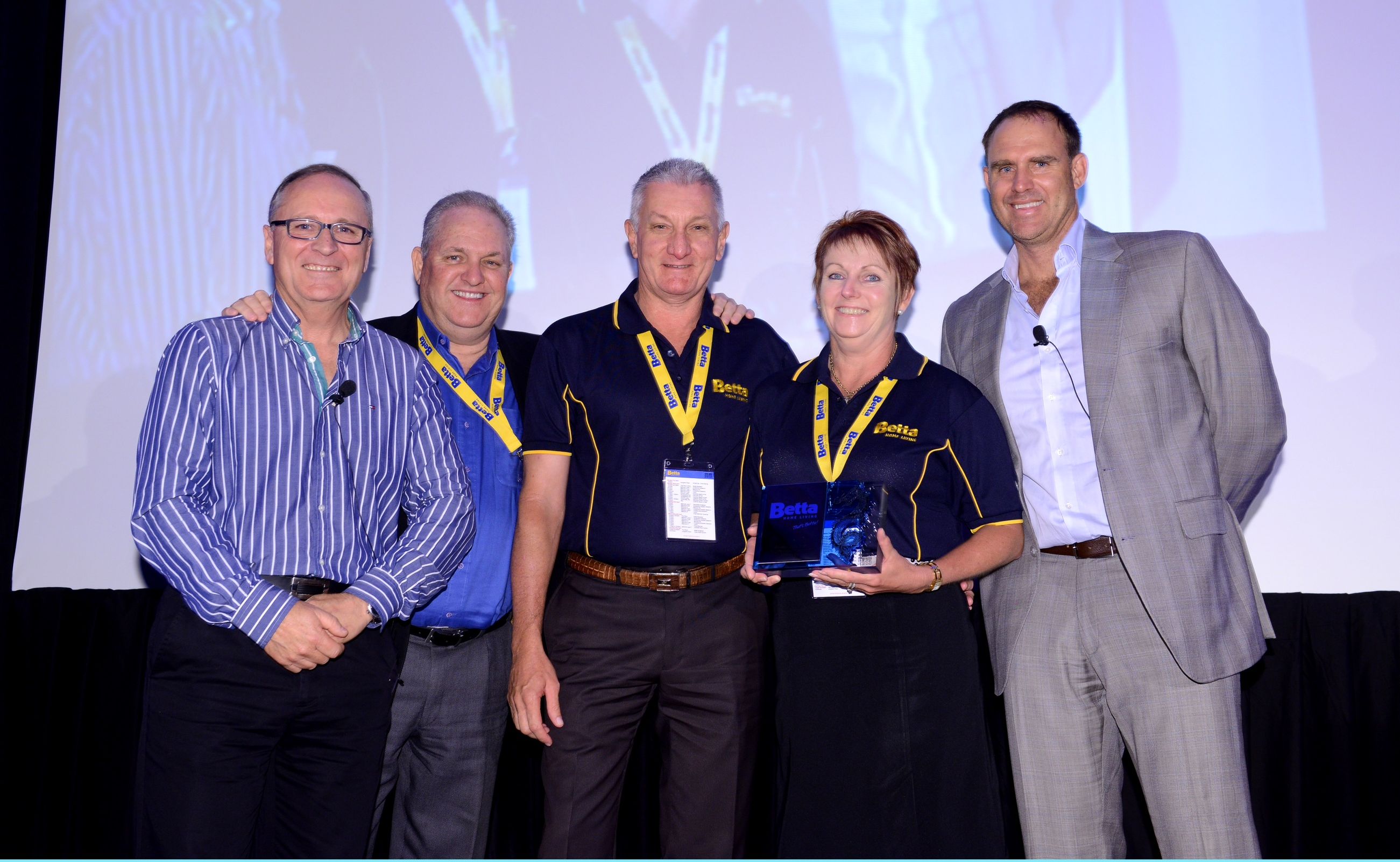 North Rockhampton Betta Home Living owners Gary and Carmel Thomasson (centre) with (from left) Betta Home Living CEO Graeme Cunningham, chairman of the board Garry Thyer and Betta's Captain of Cooking cricketer Matthew Hayden.
North Rockhampton Betta Home Living owners Gary and Carmel Thomasson (centre) with (from left) Betta Home Living CEO Graeme Cunningham, chairman of the board Garry Thyer and Betta's Captain of Cooking cricketer Matthew Hayden.