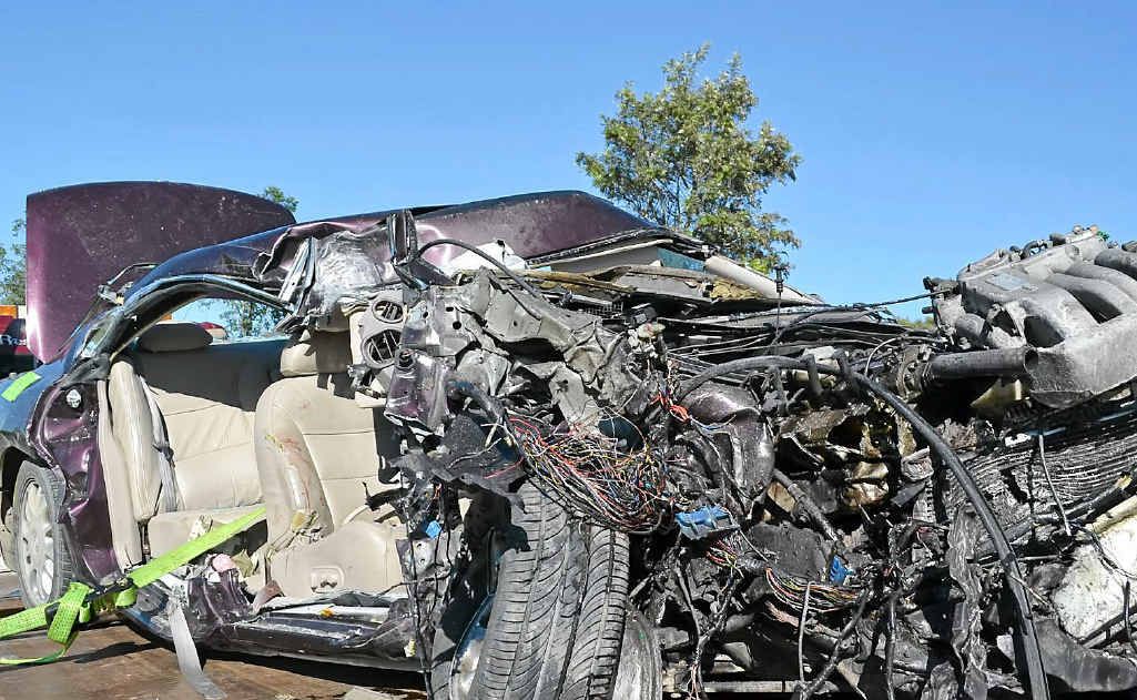 The wreck of a Mazda 929 in which a man died. The wreck of a Mazda 929 in which a man died.