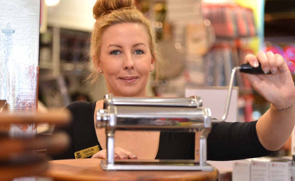 Caitlin Lawson, manager of Robin’s Kitchen at Caneland Central, demonstrates a pasta maker, which she uses to make homemade pasta at home. Caitlin Lawson, manager of Robin’s Kitchen at Caneland Central, demonstrates a pasta maker, which she uses to make homemade pasta at home.