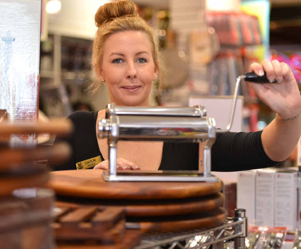 Caitlin Lawson, manager of Robin’s Kitchen at Caneland Central, demonstrates a pasta maker, which she uses to make homemade pasta at home. Caitlin Lawson, manager of Robin’s Kitchen at Caneland Central, demonstrates a pasta maker, which she uses to make homemade pasta at home.