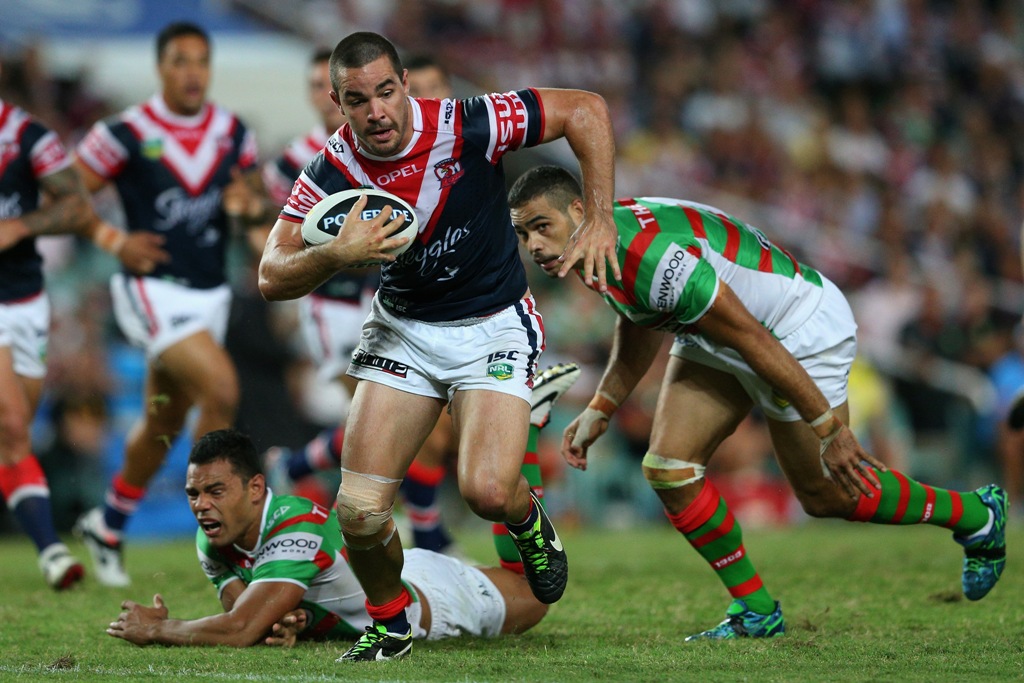 Aidan Guerra of the Roosters makes a break during the round one NRL match between the Sydney Roosters and the South Sydney Rabbitohs at Allianz Stadium on March 7, 2013 in Sydney, Australia. Aidan Guerra of the Roosters makes a break during the round one NRL match between the Sydney Roosters and the South Sydney Rabbitohs at Allianz Stadium on March 7, 2013 in Sydney, Australia.