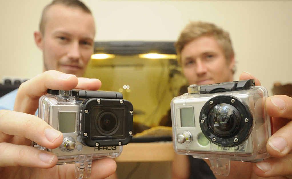 GOTCHA GOPRO: Aaron Briggs and Adam Cavanagh with two GoPro Hero cameras. One was lost four months ago at Byron Bay and was washed up at Salty Lakes, Evans Head last week. GOTCHA GOPRO: Aaron Briggs and Adam Cavanagh with two GoPro Hero cameras. One was lost four months ago at Byron Bay and was washed up at Salty Lakes, Evans Head last week.