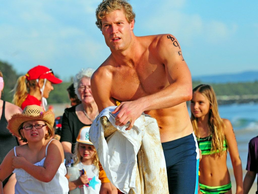 Bondi Vet. Dr. Chris Brown was at the right place at the right time when he was called to attend to a sick turtle that had been plucked from the water by Noosa Heads SLSC IRB driver Richard Webber during the 3.8km Ocean Swim at Main Beach Noosa . Geoff Potter/ Noosa News Bondi Vet. Dr. Chris Brown was at the right place at the right time when he was called to attend to a sick turtle that had been plucked from the water by Noosa Heads SLSC IRB driver Richard Webber during the 3.8km Ocean Swim at Main Beach Noosa . Geoff Potter/ Noosa News