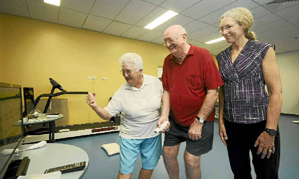 COMPUTER GAMES: Mavis and George Newell of Goonellabah with Dr Suzanne Broadbent as they play Wii games at Southern Cross University yesterday. COMPUTER GAMES: Mavis and George Newell of Goonellabah with Dr Suzanne Broadbent as they play Wii games at Southern Cross University yesterday.