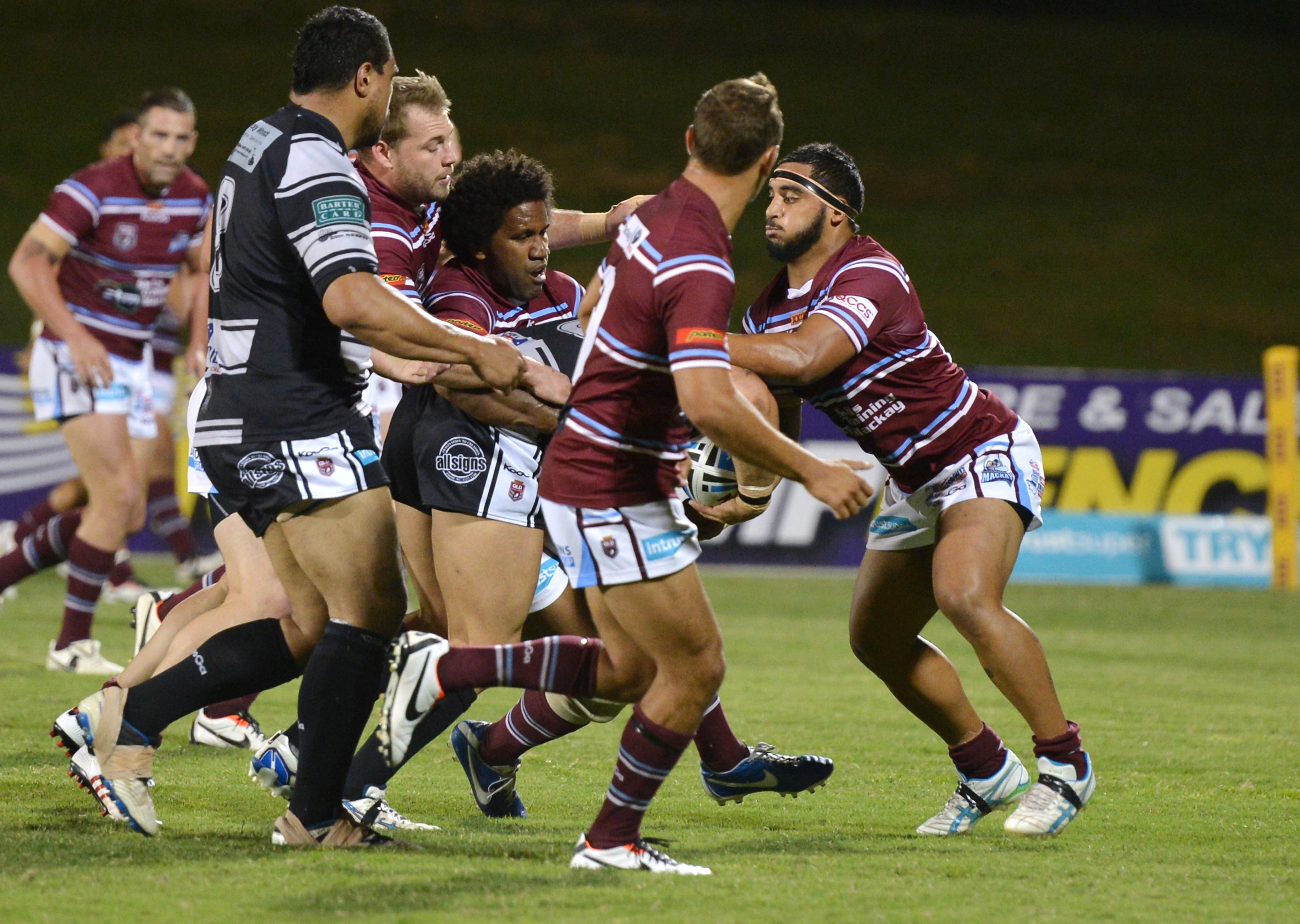 Alex Elisala (far right) in action for the Mackay Cutters on Saturday night. Alex Elisala (far right) in action for the Mackay Cutters on Saturday night.