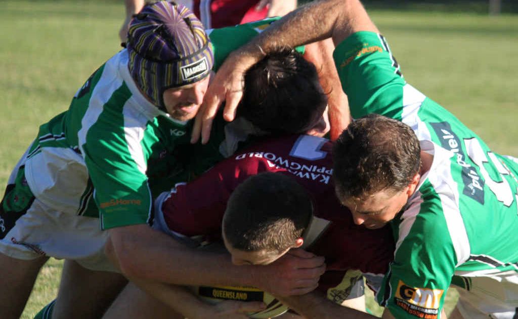 Stag player’s Josh Ryan and Brett Warren pile on to Kawana opponent in the weekend’s dominant display. Stag player’s Josh Ryan and Brett Warren pile on to Kawana opponent in the weekend’s dominant display.