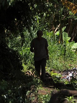 The man believed to be Sgt Robertson seen in his South Vietnam village The man believed to be Sgt Robertson seen in his South Vietnam village