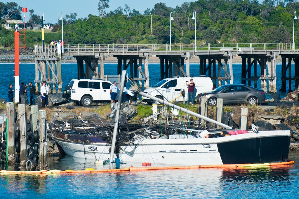 Police are conducting inquiries into a fire which destroyed a yacht and a fishing trawler at the Fisherman's co-op wharf at Coffs Harbour. Photo: Rob Wright / Coffs Coast Advocate Police are conducting inquiries into a fire which destroyed a yacht and a fishing trawler at the Fisherman's co-op wharf at Coffs Harbour. Photo: Rob Wright / Coffs Coast Advocate