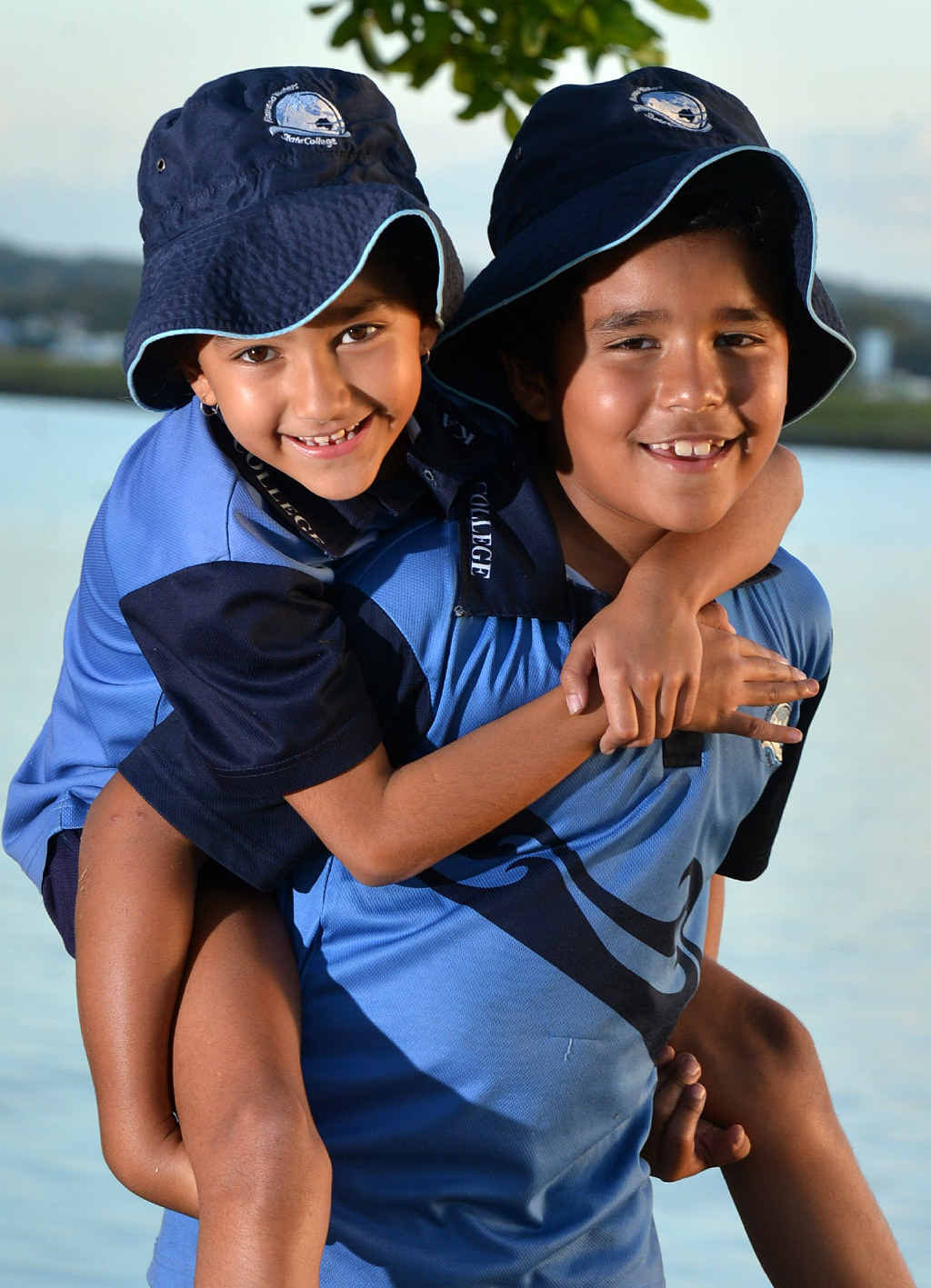 TAKING THE BUS? Kawana twins Livai and Tara Sokovagone feature on Sunbus advertising their school. TAKING THE BUS? Kawana twins Livai and Tara Sokovagone feature on Sunbus advertising their school.