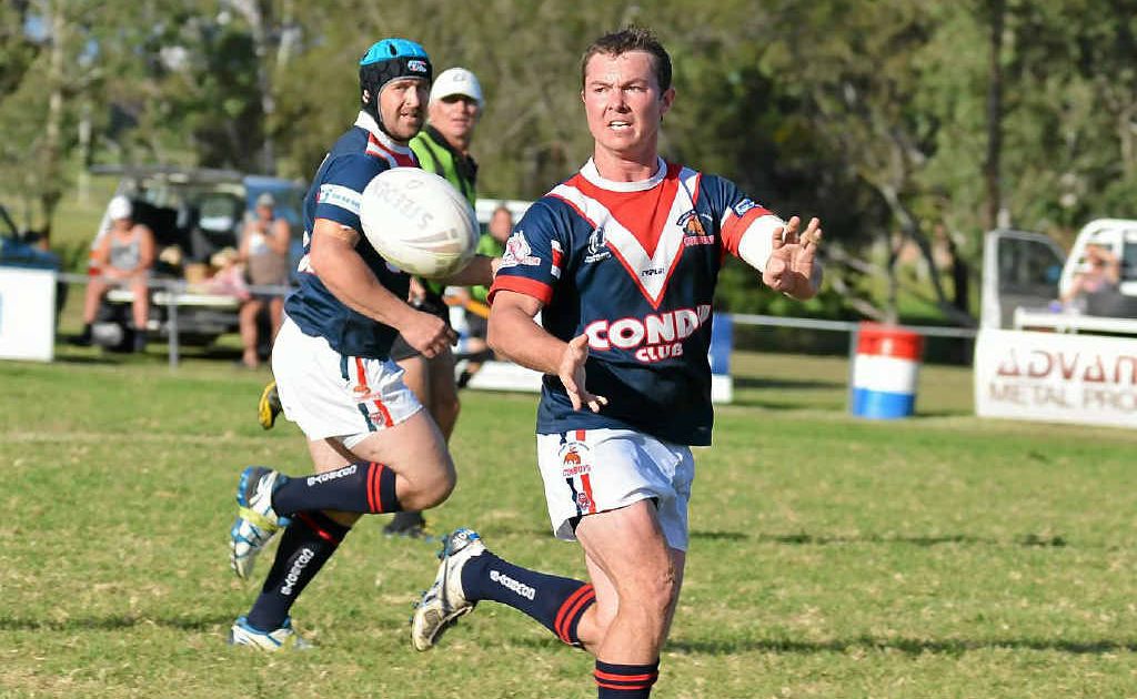 Ryan McIvor passes in the lead-up to the first Warwick Cowboys try of the second half in a 32–28 victory against Dalby. Ryan McIvor passes in the lead-up to the first Warwick Cowboys try of the second half in a 32–28 victory against Dalby.