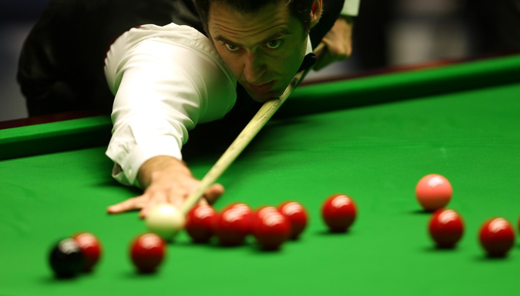 Ronnie O'Sullivan of England in action against Barry Hawkins of England during the final of the Betfair World Snooker Championship at the Crucible Theatre on May 6, 2013 in Sheffield, England. Ronnie O'Sullivan of England in action against Barry Hawkins of England during the final of the Betfair World Snooker Championship at the Crucible Theatre on May 6, 2013 in Sheffield, England.
