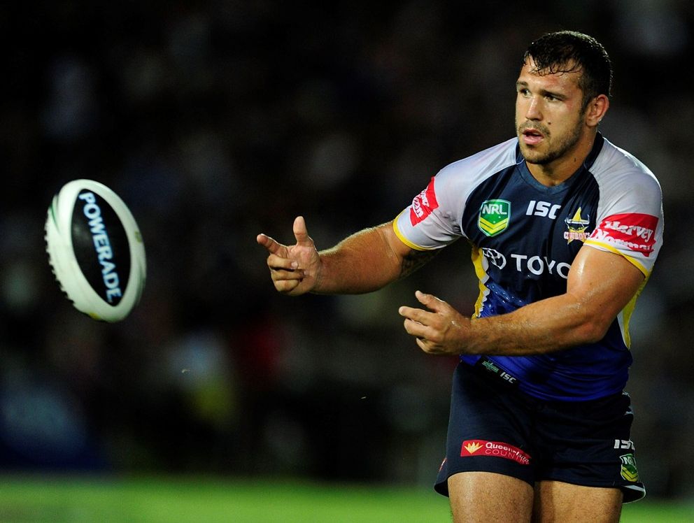 Scott Moore of the Cowboys passes the ball during the round two NRL match between the North Queensland Cowboys and the Melbourne Storm at 1300SMILES Stadium on March 16, 2013 in Townsville, Australia. Scott Moore of the Cowboys passes the ball during the round two NRL match between the North Queensland Cowboys and the Melbourne Storm at 1300SMILES Stadium on March 16, 2013 in Townsville, Australia.