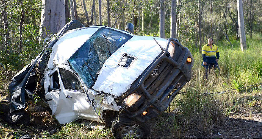 The two female occupants of this Toyota Hilux were lucky to walk from the wreck after a rollover on the Wide Bay Hwy yesterday. The two female occupants of this Toyota Hilux were lucky to walk from the wreck after a rollover on the Wide Bay Hwy yesterday.