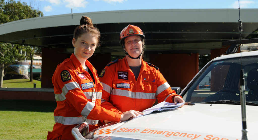 SES volunteers Felicity and Tess Reardon can’t wait for the free concert tomorrow were standing on the same spot in Nelson Reserve during the floods, as they were yesterday. SES volunteers Felicity and Tess Reardon can’t wait for the free concert tomorrow were standing on the same spot in Nelson Reserve during the floods, as they were yesterday.