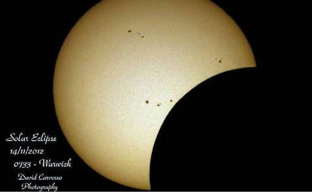 COVER UP: A photo from the solar eclipse from Warwick last year. COVER UP: A photo from the solar eclipse from Warwick last year.