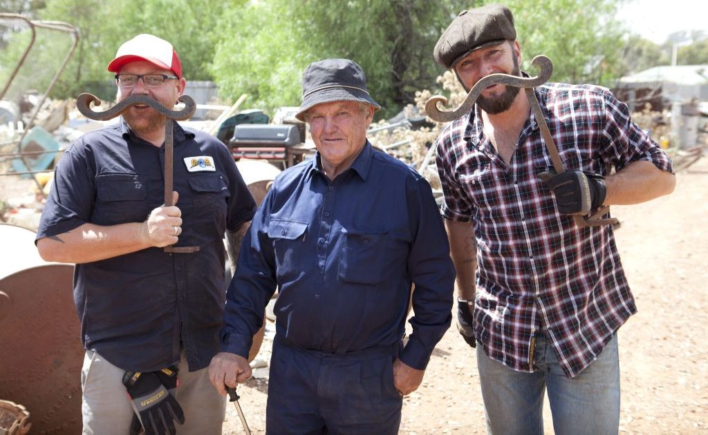 Aussie Pickers hosts Adam McDonald, left, and Lucas Callaghan, right, pictured with collector Jim Crocker in a scene from the show. Aussie Pickers hosts Adam McDonald, left, and Lucas Callaghan, right, pictured with collector Jim Crocker in a scene from the show.