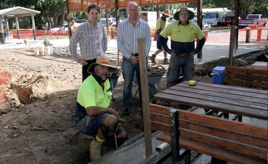 Hayden Bunyan and Fred Parsons from the council's parks projects team put the finishing touches to a new picnic bench as events, sport and recreation open space portfolio councillor Darren Everard and Deputy Mayor George Seymour look on. Hayden Bunyan and Fred Parsons from the council's parks projects team put the finishing touches to a new picnic bench as events, sport and recreation open space portfolio councillor Darren Everard and Deputy Mayor George Seymour look on.