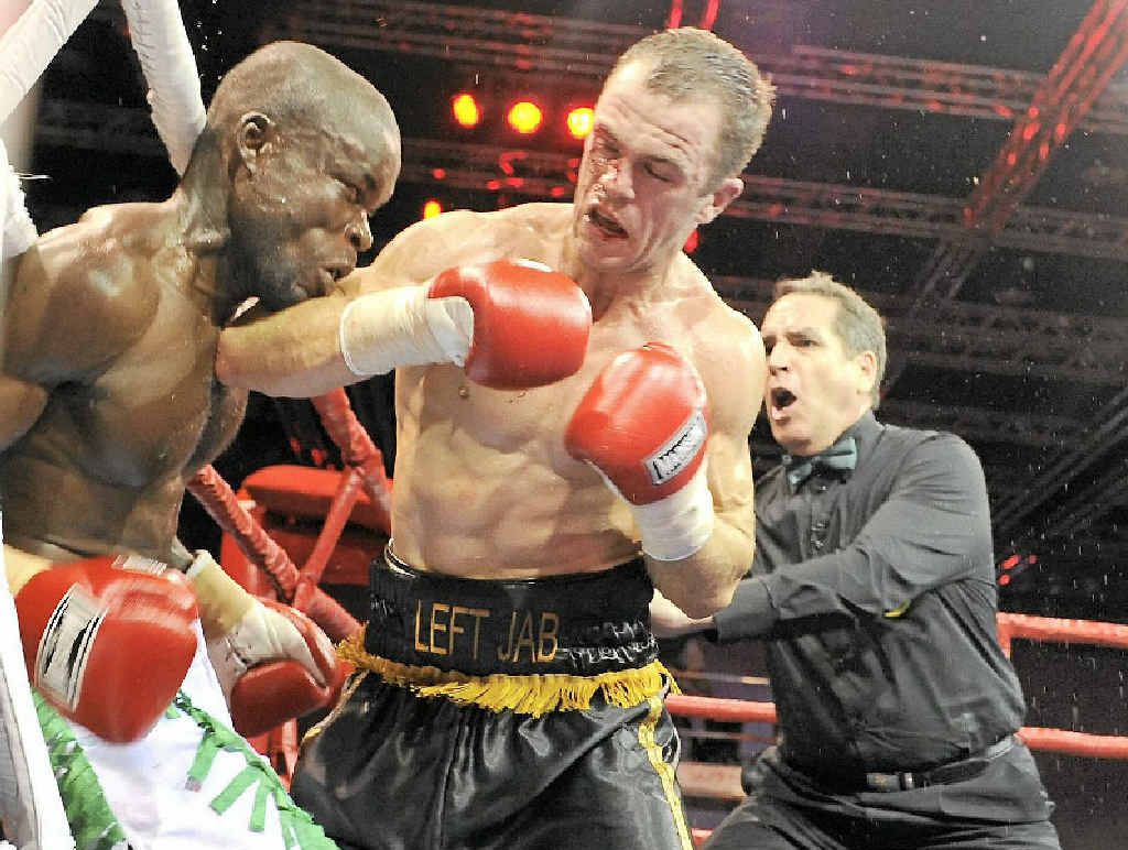 TAKE THAT: Hervey Bay’s Jarrod Fletcher stops Ghanaian Philip Kotey in the sixth round. TAKE THAT: Hervey Bay’s Jarrod Fletcher stops Ghanaian Philip Kotey in the sixth round.