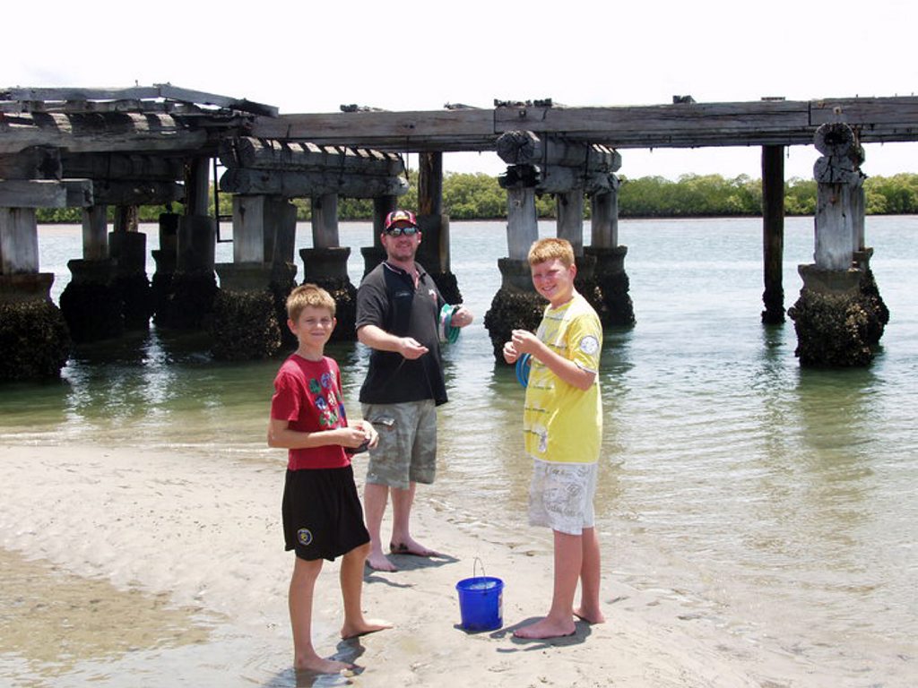 Michael Clifton teaching Michael Boggan and his brother to fish in 2010. Photo: Facebook Michael Clifton teaching Michael Boggan and his brother to fish in 2010. Photo: Facebook