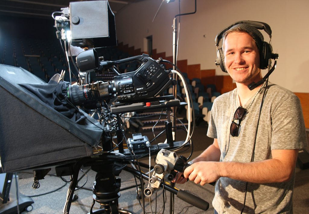 HOOKING UP: Third-year Applied Media USQ student Tyron Gillum on the set of Connected, a new variety television program aimed at connecting south-east Queensland. HOOKING UP: Third-year Applied Media USQ student Tyron Gillum on the set of Connected, a new variety television program aimed at connecting south-east Queensland.
