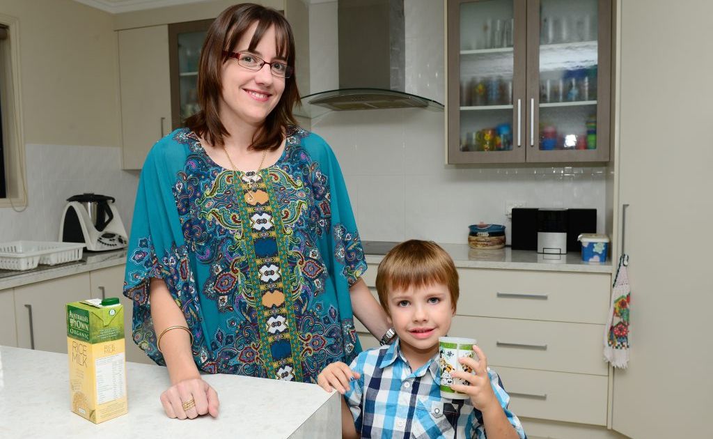 Nicole Bloomfield pours her son Riley some rice milk. Riley is allergic to dairy. Nicole Bloomfield pours her son Riley some rice milk. Riley is allergic to dairy.