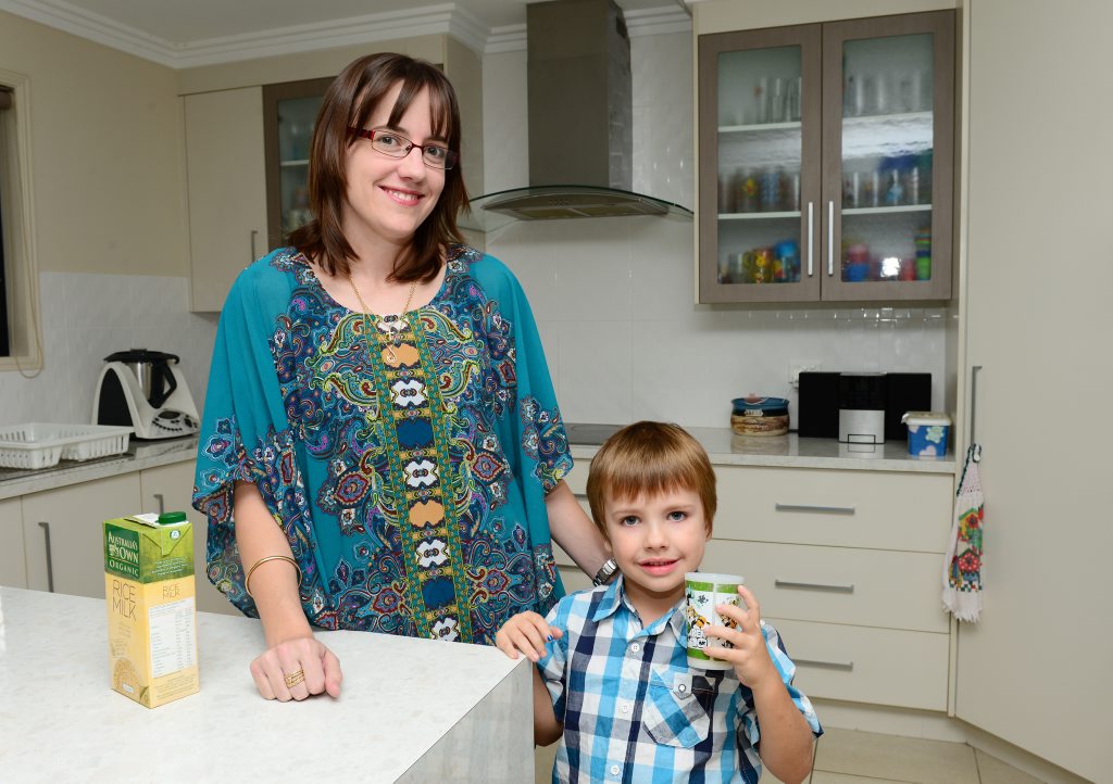 Nicole Bloomfield pours her son Riley some rice milk. Riley is allergic to dairy. Nicole Bloomfield pours her son Riley some rice milk. Riley is allergic to dairy.