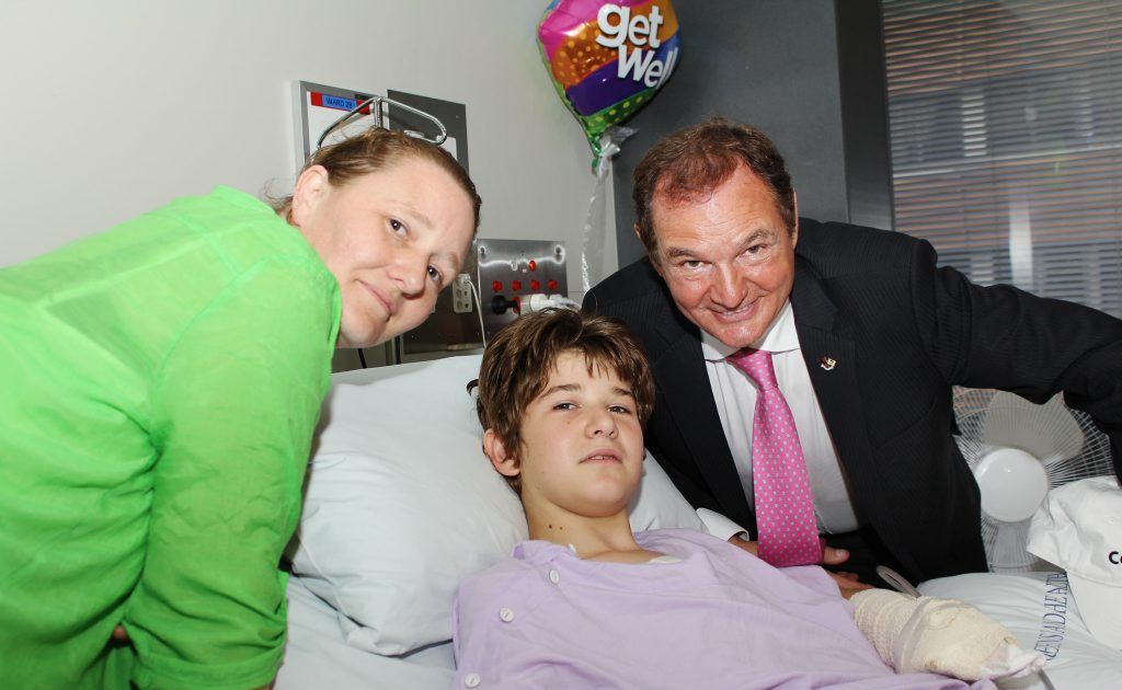 HOSPITAL VISIT: Ipswich Mayor Paul Pisasale with Michael Boggan and his mother Rebecca. HOSPITAL VISIT: Ipswich Mayor Paul Pisasale with Michael Boggan and his mother Rebecca.