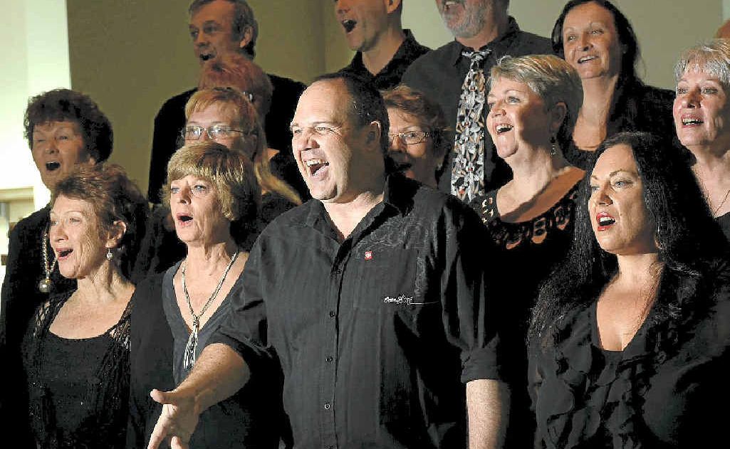 Voice Weavers' musical director Brett Logan with the singers practising at St Augustine’s church before their trip to Vietnam. Voice Weavers' musical director Brett Logan with the singers practising at St Augustine’s church before their trip to Vietnam.