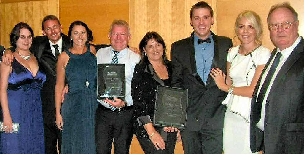 The Shed Company’s Tim Churchill (third from right) and employees celebrate their second Dealer of the Year title at a recent national franchisee awards. The Shed Company’s Tim Churchill (third from right) and employees celebrate their second Dealer of the Year title at a recent national franchisee awards.