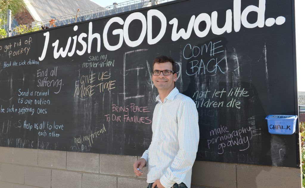 THE WRITTEN WORD: Senior pastor Scott Muir from Central Church Ipswich beside the blackboard. THE WRITTEN WORD: Senior pastor Scott Muir from Central Church Ipswich beside the blackboard.