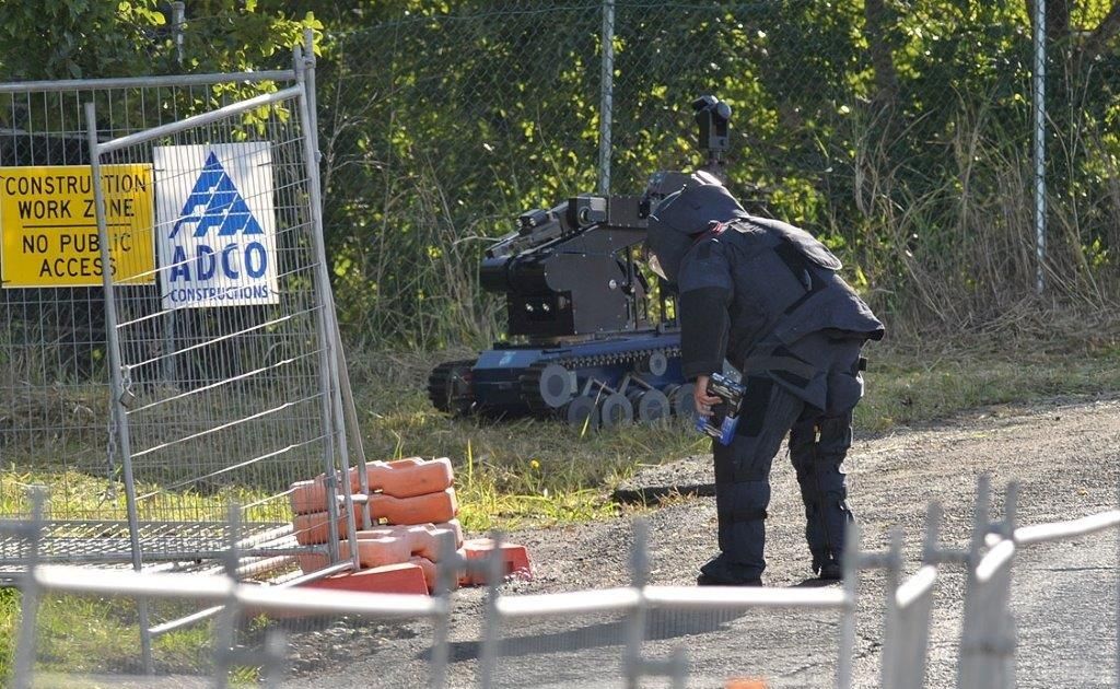 The police bomb squad deal with a suspicious package at the Bunnings Warehouse construction site in West Ipswich. The police bomb squad deal with a suspicious package at the Bunnings Warehouse construction site in West Ipswich.