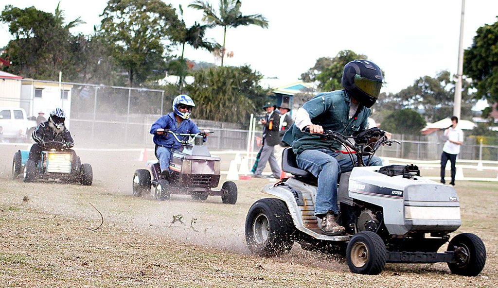 Dirt and dust flies as low slung, wide wheel based racing mowers tear around the 300 metre by six lap circuit. Photos from the 2012 Grand Prix. Dirt and dust flies as low slung, wide wheel based racing mowers tear around the 300 metre by six lap circuit. Photos from the 2012 Grand Prix.