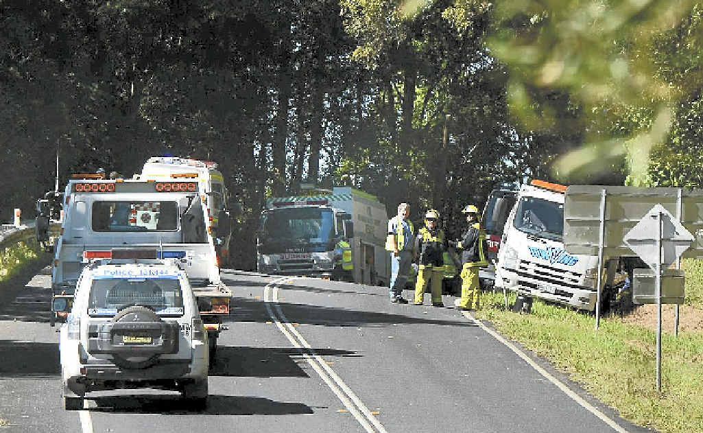 Rescue workers on the scene of the fatal crash. Rescue workers on the scene of the fatal crash.